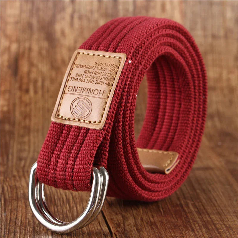 Maroon woven fabric belt with silver double D-ring buckle and tan leather accents, casual style