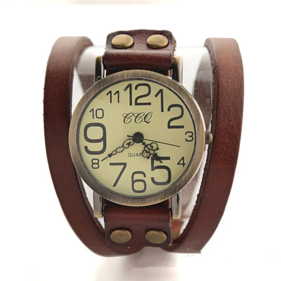 Vintage wide brown leather strap wristwatch with large numerals and bronze metal case