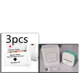 Mini portable thermal label printer with white and mint green body, USB cable, and three rolls of thermal sticker paper.