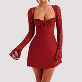 Red mini dress with lace long sleeves, fitted bodice, and sweetheart neckline.