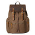 Brown canvas backpack with leather flap, multiple pockets, and adjustable straps