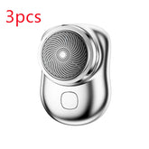 Silver compact electric shaver with sleek metallic finish and circular blade design