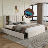 Modern upholstered bed with tufted headboard, neutral bedding, and built-in wireless charging station