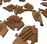 Wooden engraved puzzle pieces with heartfelt quotes, rustic home decor accent.