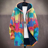 Colorful abstract print hooded jacket with fleece lining and relaxed fit, displayed on hanger