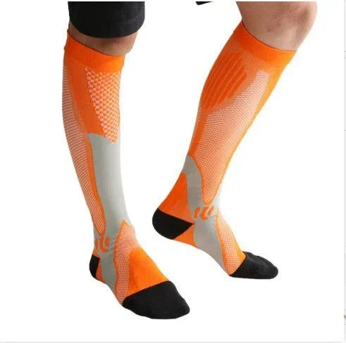 Orange and gray knee-high compression socks with black toes, sporty and snug fit