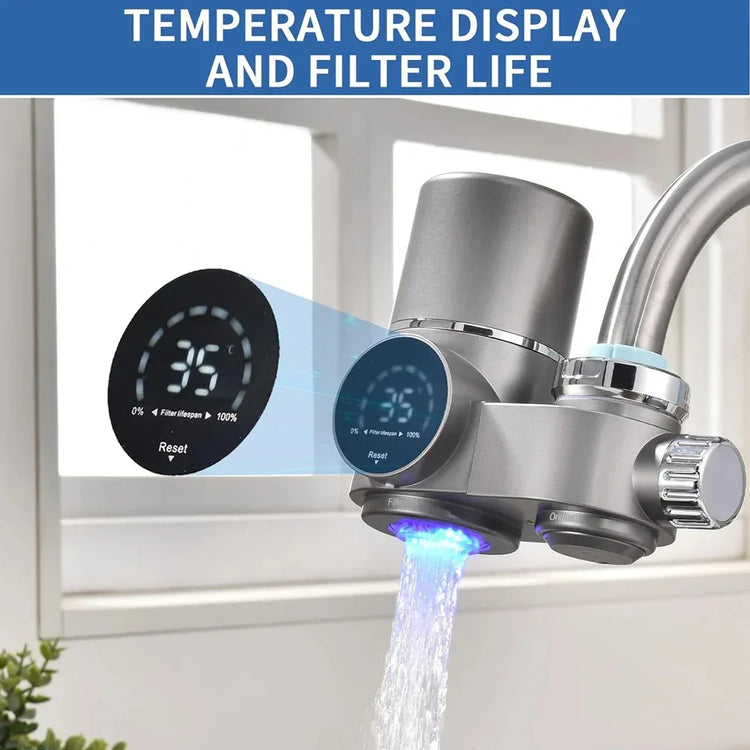 Silver faucet water filter with digital display showing temperature and filter lifespan, modern kitchen setting.
