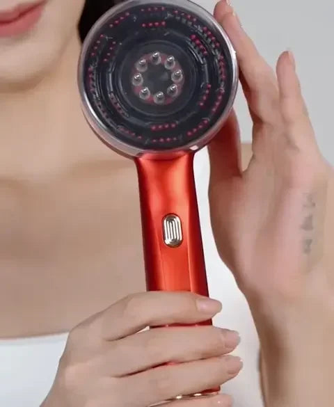 Woman holding red handheld hair dryer with circular nozzle and sleek design