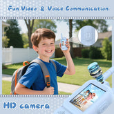 Smiling boy wearing blue t-shirt and gray backpack, holding a light blue handheld device with HD camera, standing outdoors.