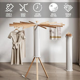 Beige short-sleeve belted dress on wooden drying rack, minimalist modern design, relaxed fit