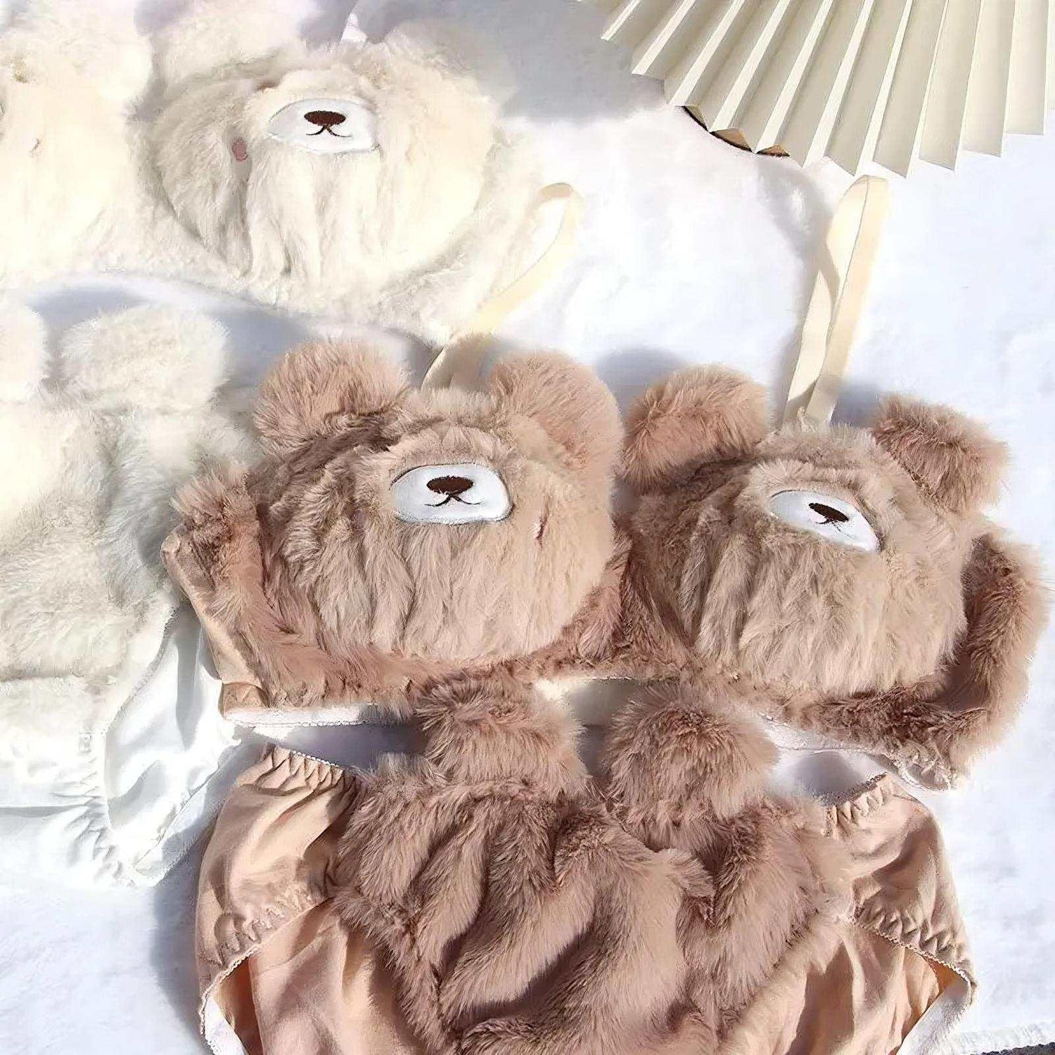 Cute teddy bear plush lingerie set in beige and white, featuring fuzzy texture and playful design.