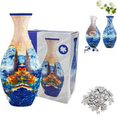 3D puzzle vase with colorful blue and orange scenic design, displayed with box and puzzle pieces