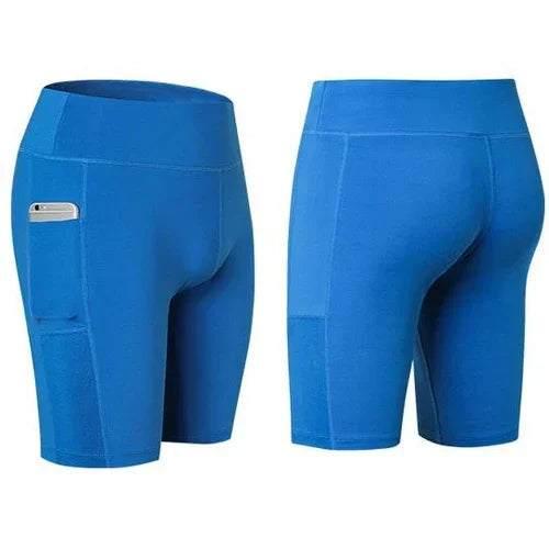 Bright blue fitted biker shorts with side pocket, stretchy athletic material, mid-thigh length.