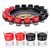 Roulette shot glass set with red and black numbered glass cups around a black roulette tray.