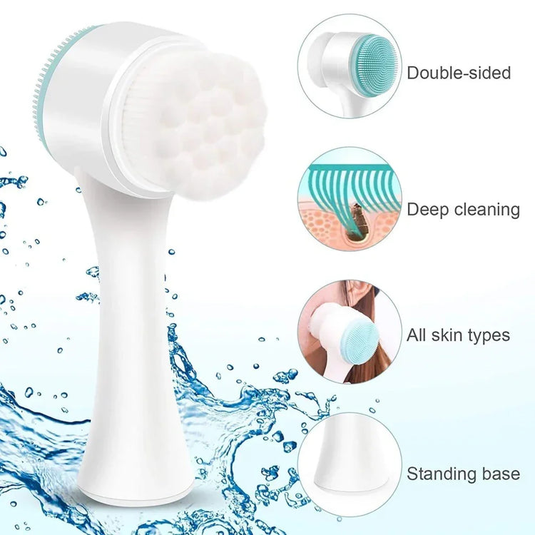 Double-sided white and teal facial cleansing brush with soft bristles, ergonomic handle, and standing base, suitable for all skin types.