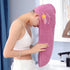 Woman wearing a white ribbed crop top and a purple microfiber hair towel wrap with star detail.