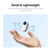 Tiny 35g action camera floating above hand, ultra-lightweight and portable for on-the-go use