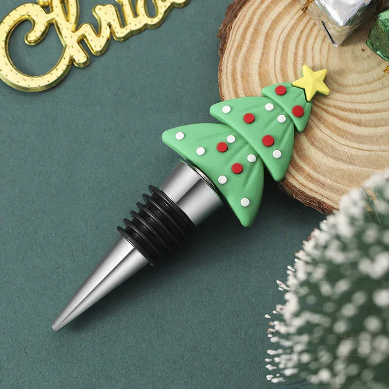 Christmas tree wine bottle stopper with green silicone top and stainless steel base