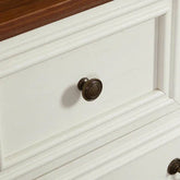 White wood drawer with bronze round knob and brown wood top, classic home furniture style
