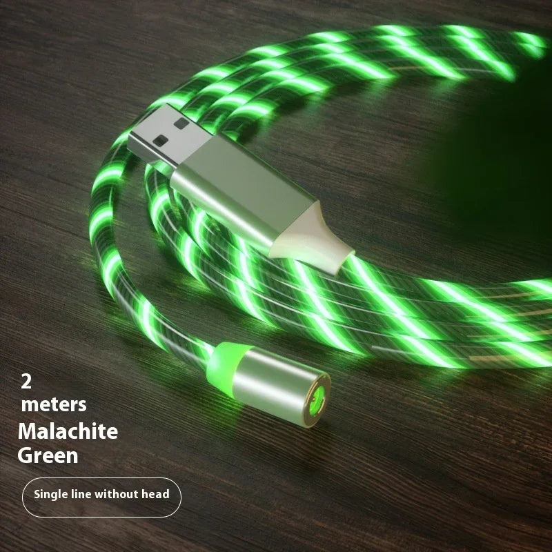 Glowing malachite green 2-meter USB charging cable with spiral LED lights on dark wood surface