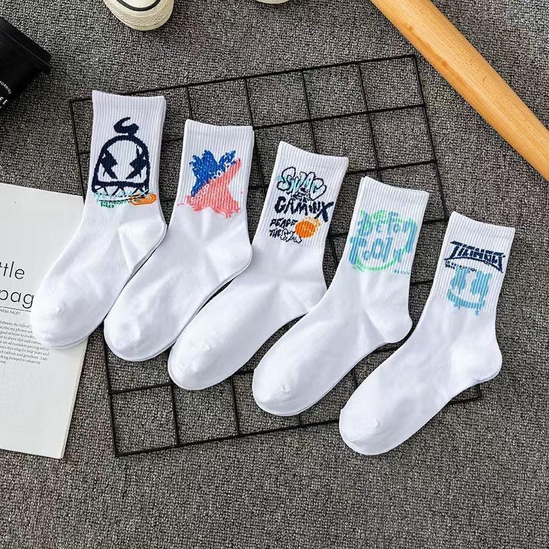 Set of five white crew socks with colorful graphic prints, cotton casual streetwear style.