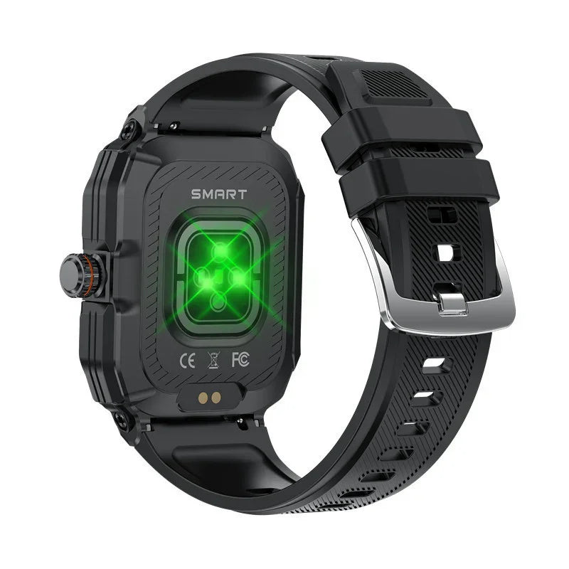 Black rugged smart watch with silicone band and glowing green heart rate sensor