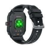 Black rugged smart watch with silicone band and glowing green heart rate sensor
