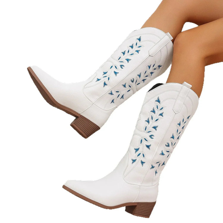 White western cowboy boots with blue embroidery, block heel, and mid-calf fit