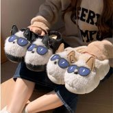 Fluffy animal-themed slip-on slippers in black and beige with 3D ears and blue sunglasses detail