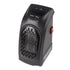 Compact black portable electric heater with digital controls and air vent, modern design