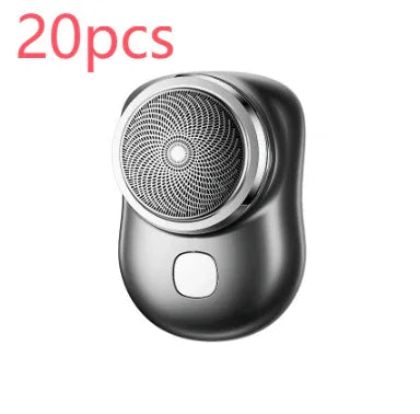 Compact black and silver electric shaver with circular blade design, modern tech accessory