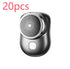 Compact black and silver electric shaver with circular blade design, modern tech accessory