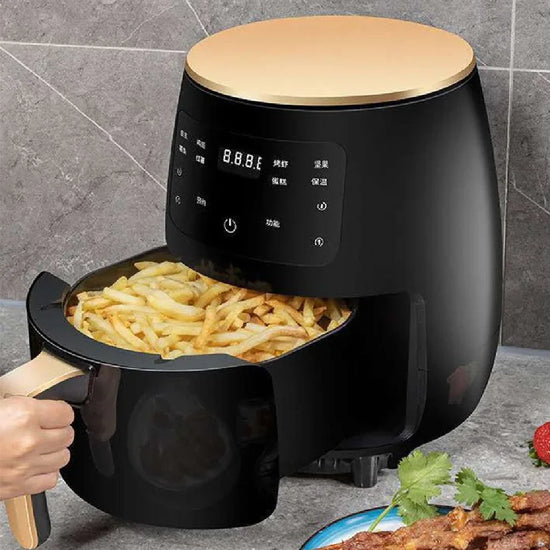 Black digital air fryer with gold accents cooking French fries on kitchen counter