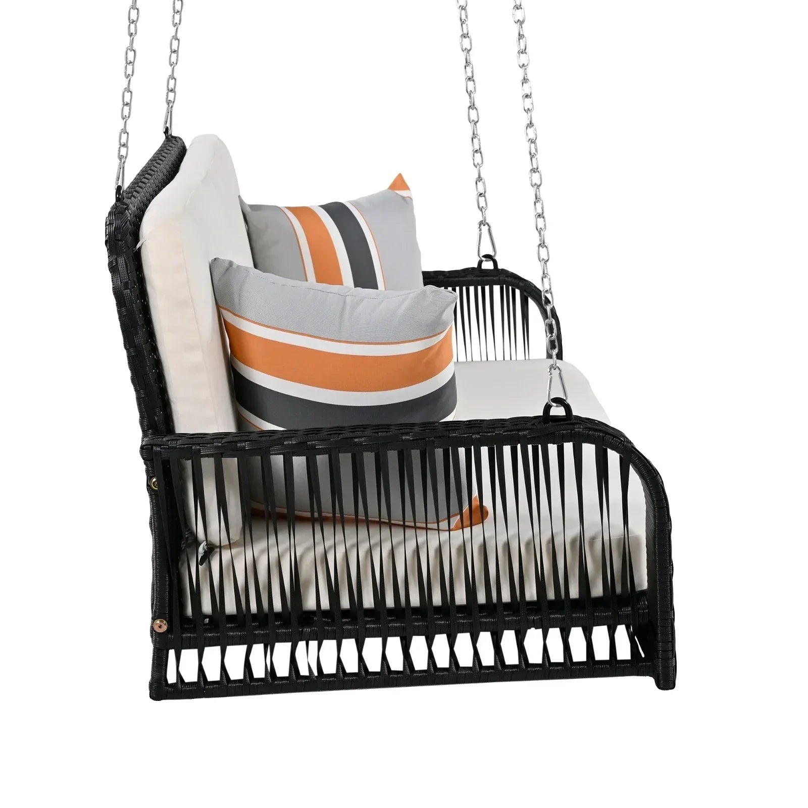 Modern black rattan hanging swing chair with cream cushions and striped accent pillows