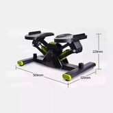 Compact black and green stepper exercise machine with textured foot pedals, dimensions shown