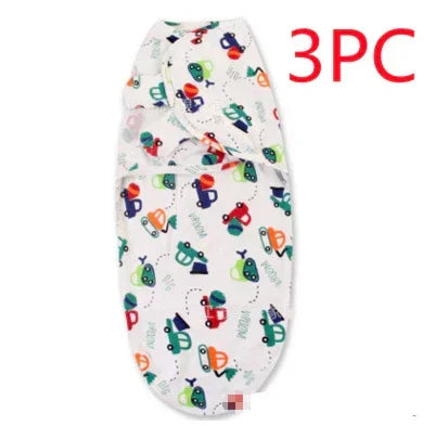 White cotton baby swaddle with colorful car print, adjustable fit, 3 piece set