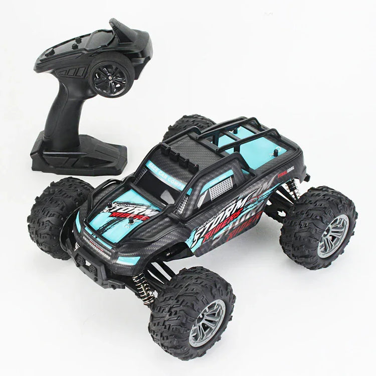 Black and blue remote control off-road truck with rugged tires and handheld controller