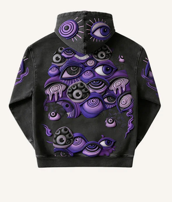 Black hoodie with bold purple eye graphic, streetwear style, relaxed fit, cotton material