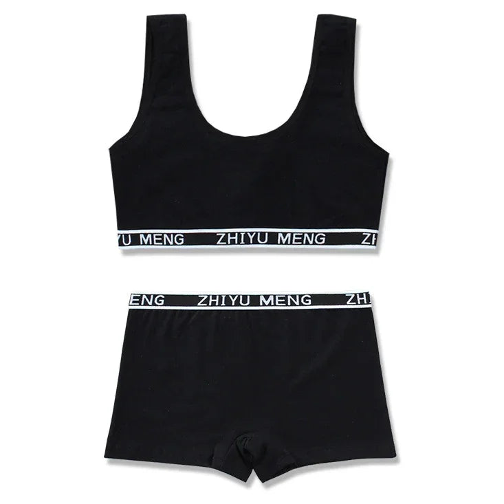 Black cotton lounge set with elastic waistband, crop tank top and boxer shorts, sporty fit