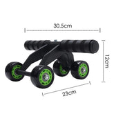 Black and green ab roller with foam grip handles, four wheels, 30.5cm wide, 23cm long