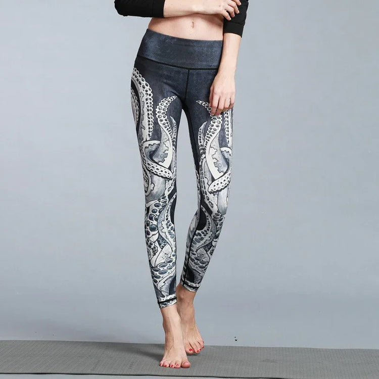 Woman wearing high-waisted black and white octopus print leggings, form-fitting style.