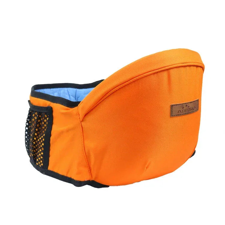 Bright orange hip seat carrier with mesh side pocket and soft fabric, ergonomic fit