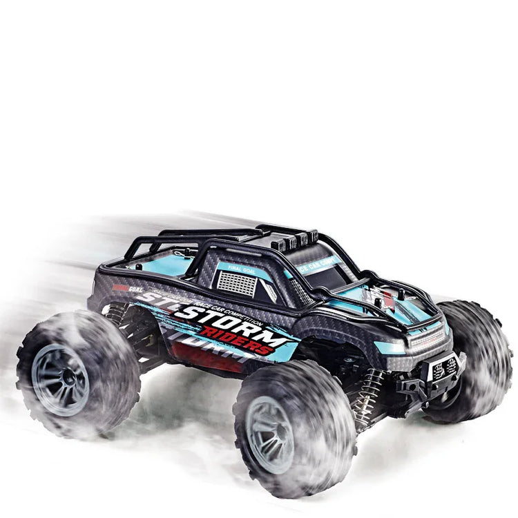 Off-road RC truck with large tires, black and blue body, and rugged details drifting on white