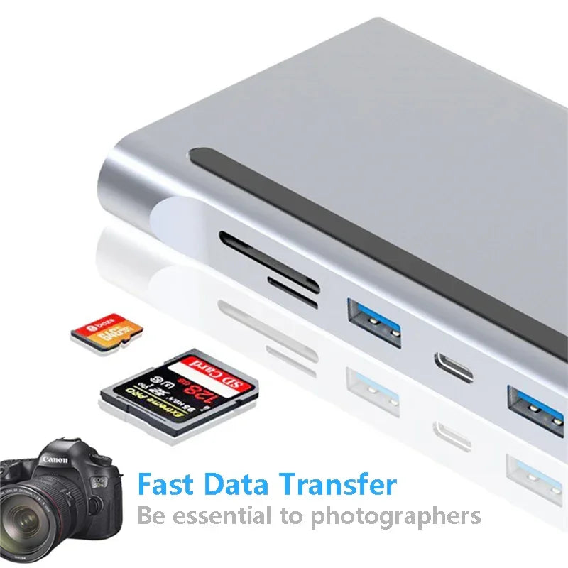 Silver USB hub with SD card slots, USB ports, and memory cards, suitable for data transfer