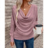 Woman in mauve cowl neck long sleeve top and blue jeans, casual streetwear style