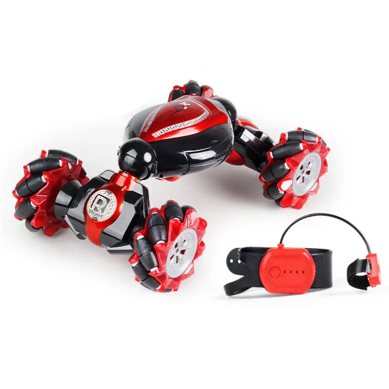 Black and red remote control stunt car with oversized wheels and wrist controller