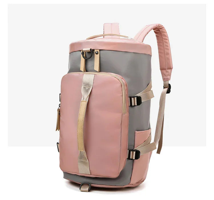 Pink and gray backpack with large front pocket, adjustable straps, and water-resistant material