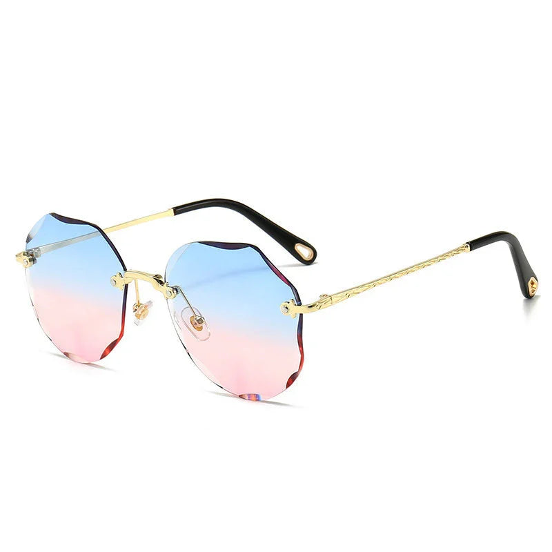 Scalloped rimless sunglasses with gold metal arms and blue to pink gradient lenses
