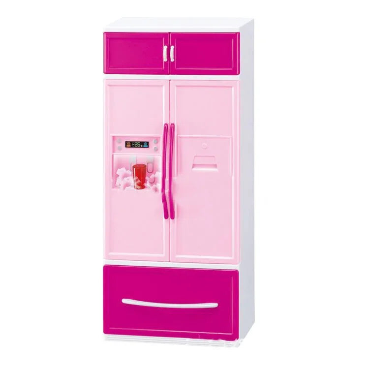 Pink and white toy refrigerator with side-by-side doors, freezer drawer, and drink dispenser.