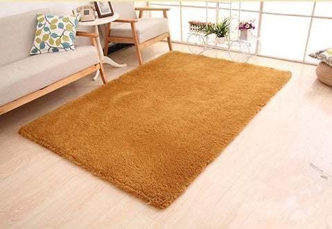 Modern living room with a soft, rectangular, brown shaggy rug on light wooden floor